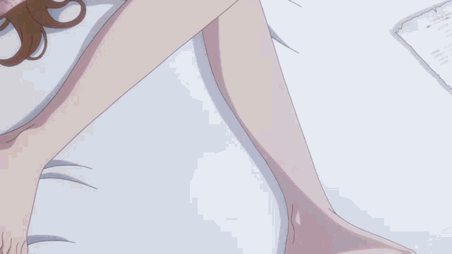 a close up of a woman 's legs with a pink shirt on