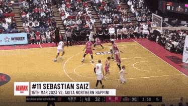 a basketball game is being played between akita northern happini and alvark