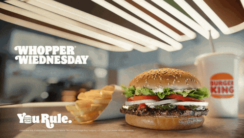 a burger king advertisement shows a hamburger and french fries