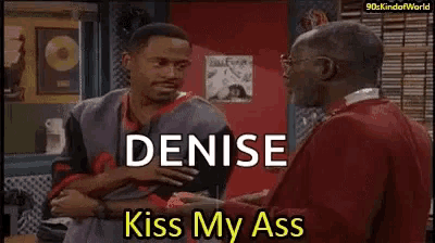 two men are standing next to each other and one of them is saying denise kiss my ass .