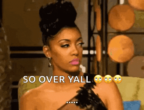a woman in a black dress is sitting on a couch and saying `` so over y'all '' .