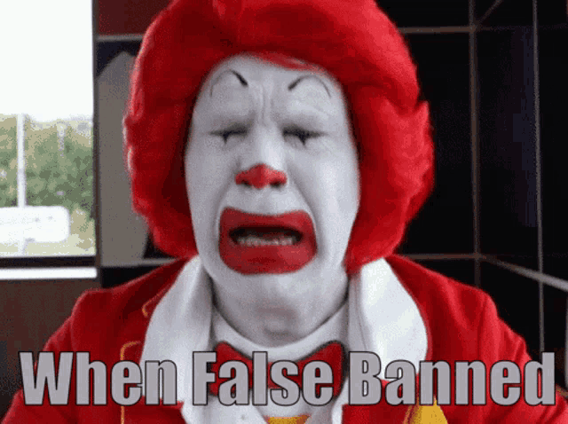 a mcdonald 's clown is crying with the words when false banned above him