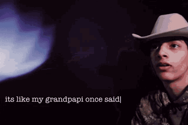 a young man wearing a cowboy hat with the words " it 's like my grandpapi once said " next to him