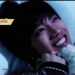a close up of a person 's face with a yellow sticker that says ' onlyhottest ' on it