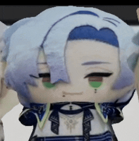 a close up of a stuffed doll with blue hair and green eyes .