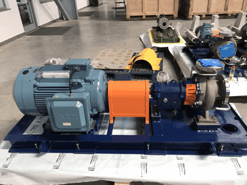 an abb motor is sitting on top of a blue platform