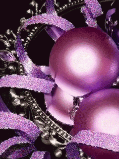 purple christmas ornaments with purple ribbons and a black background