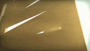 a light shines through a hole in the wall