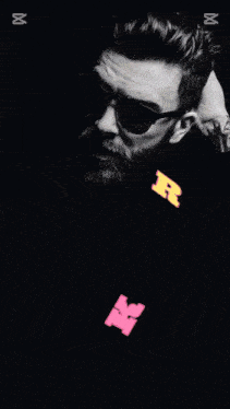 a yellow box with the letter r on it in pink