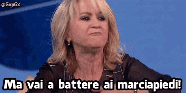 a woman says ma vai a battere ai marciapiedi with a blue background