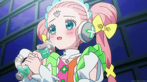a girl with headphones and a flower on her forehead is holding a bottle of water
