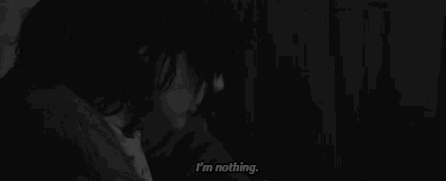 a black and white photo of a person saying i 'm nothing ..