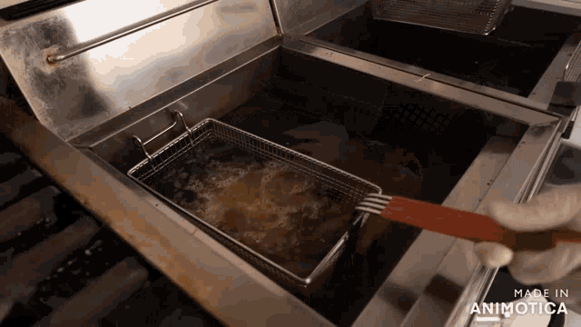 a fryer with the words made in animatica on the bottom of it