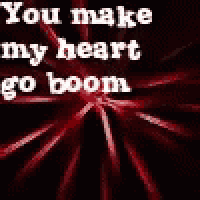 a picture of a fireworks display with the words `` you make my heart go boom '' .