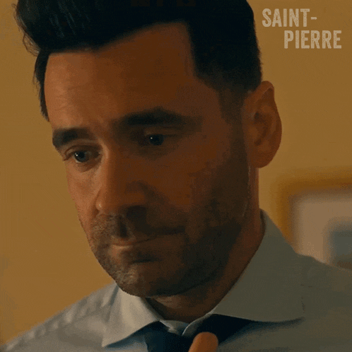 a close up of a man 's face with the words saint-pierre written on the bottom