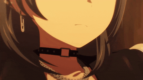 a close up of a woman 's neck with a choker and earrings
