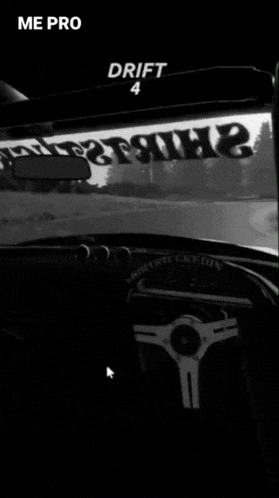 a black and white photo of a car with drift 20 written on the screen
