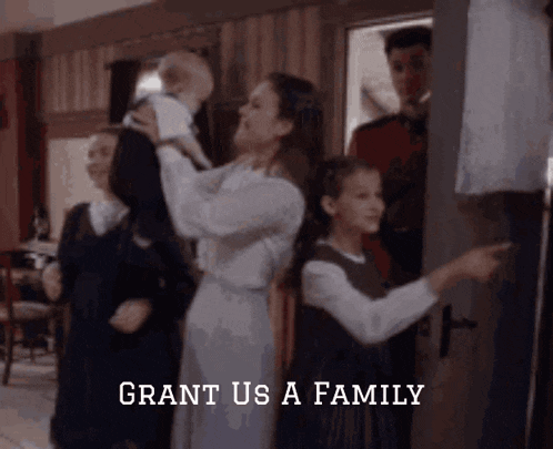 a woman holding a baby with the words grant us a family written below her