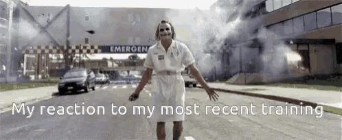 the joker is standing in front of an emergency exit