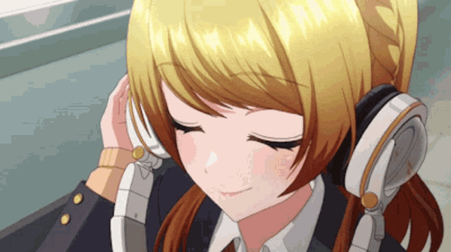 a girl with blonde hair is wearing headphones and smiling with her eyes closed