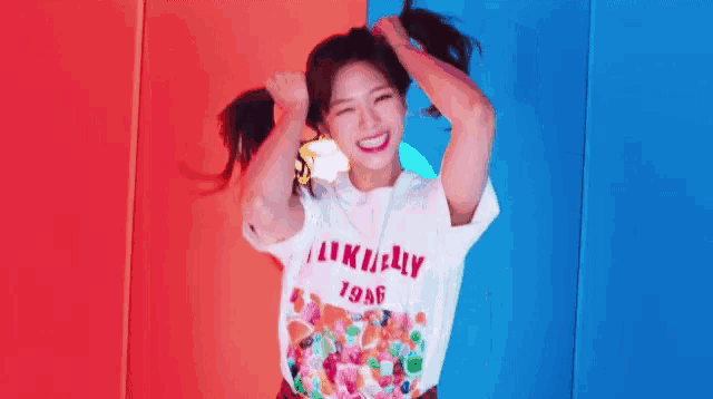 a woman wearing a white shirt that says i like jelly 1996