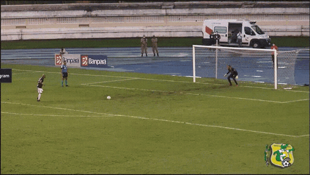 a soccer game is being played in a stadium with banners for banpaid