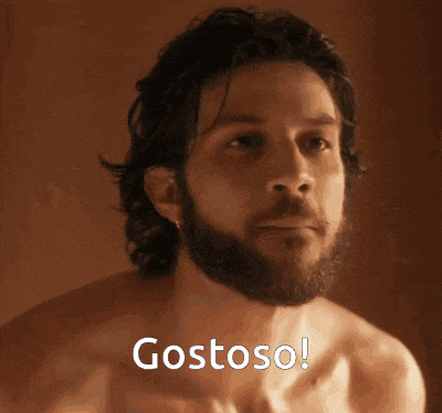 a shirtless man with a beard says gostoso on the bottom