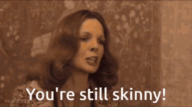 a man in a suit and tie says " you 're still skinny ! "