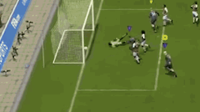 a group of soccer players are playing a game on a field