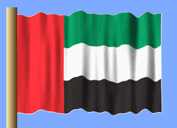 the flag of the united arab emirates is waving in the wind against a blue sky