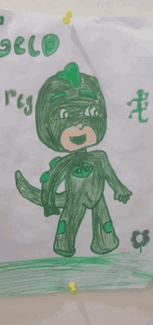 a child 's drawing of a green lizard with the word gecko written on the bottom
