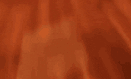 a blurry image of a person 's face with a white background