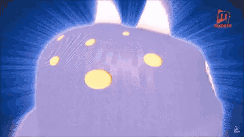 a purple object with yellow dots on it is being displayed on a blue screen .