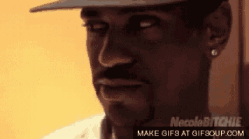 a close up of a man wearing a hat with the words make gifs at gifsoup.com in the corner