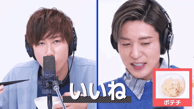 a man wearing headphones is eating food next to another man