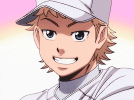 a young boy wearing a baseball cap is smiling and looking at the camera