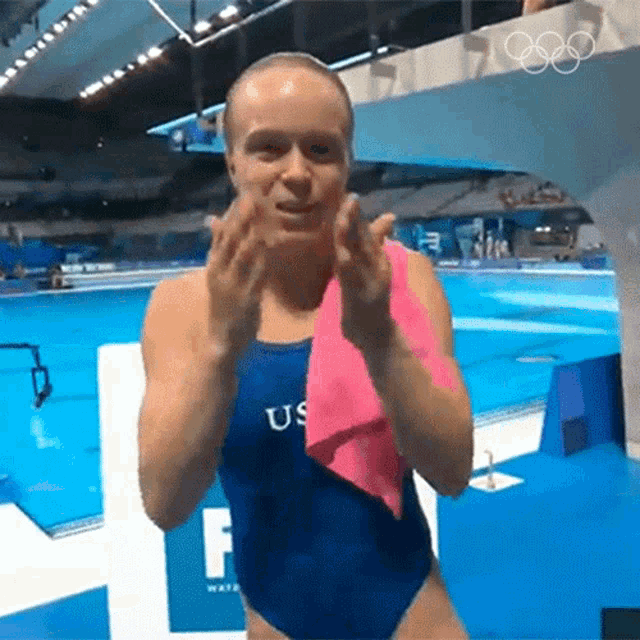 a woman in a blue swimsuit with us on it