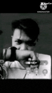 a black and white photo of a man 's face with the words kinemaster on the bottom