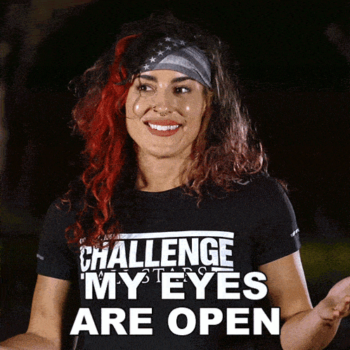 a woman wearing a challenge my eyes are open t-shirt