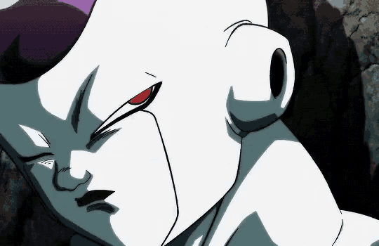 a close up of a character 's face with a red eye