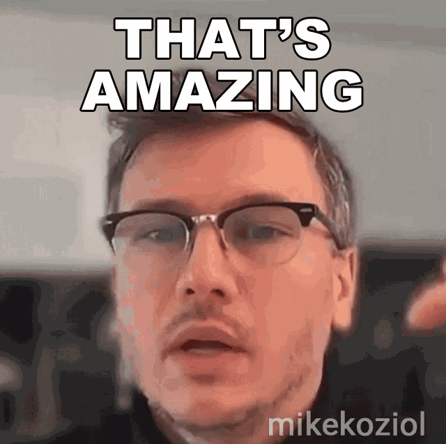 a man wearing glasses says " that 's amazing " in front of his face