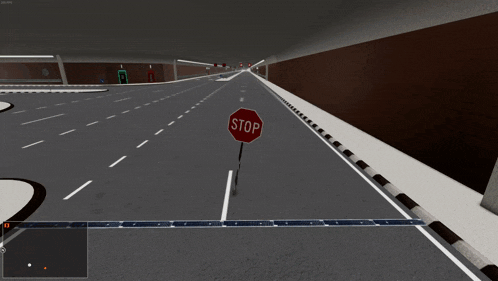 a stop sign is in the middle of the road