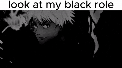 a black and white image of a smiling anime character with the words `` look at my black role '' .