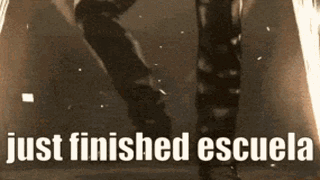 a black and white photo with the words just finished escuela on the bottom