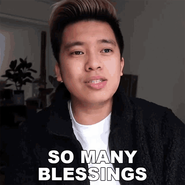 a man says " so many blessings " in front of his face