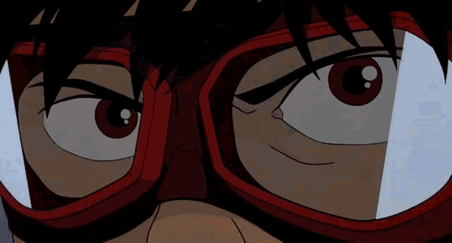 a close up of a cartoon character 's eyes with goggles