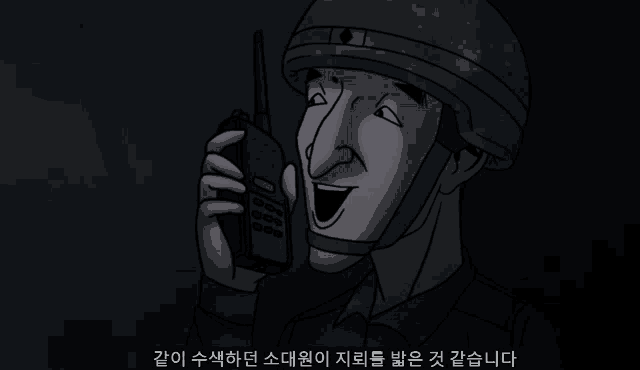 a man in a helmet is talking on a walkie talkie in a dark room
