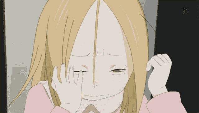 a girl with blonde hair and a pink shirt is looking at the camera