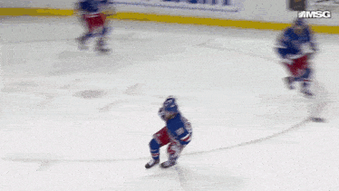 a hockey game is being shown on a screen that says msg