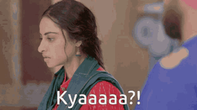 a woman with a green scarf around her neck says kyaaaa ?